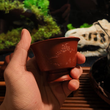 Terasilk Handmade Yixing Teacup | Engraved Plum Blossom Pedestal Cup | Premium Red Zisha Clay-60ml