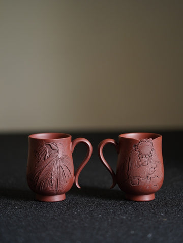 Good relationships lead to wealth and happiness. Exquisite and challenging glaze carving on purple sand porcelain, designed by the master potter.-150ml