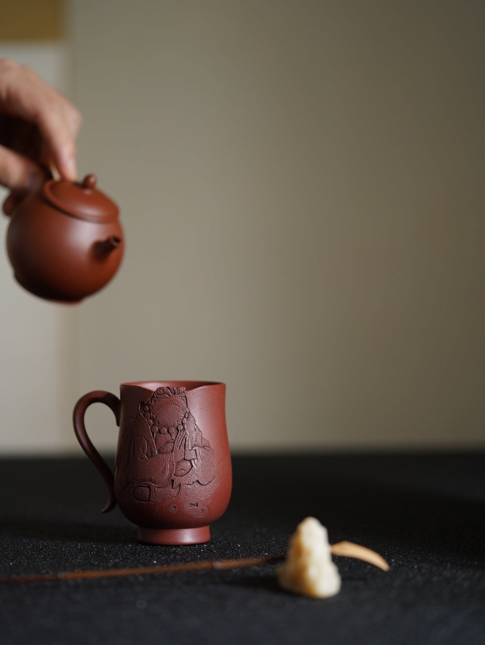 Good relationships lead to wealth and happiness. Exquisite and challenging glaze carving on purple sand porcelain, designed by the master potter.-150ml